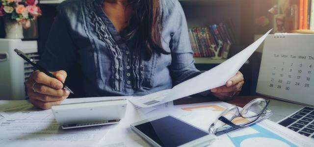 woman doing taxes